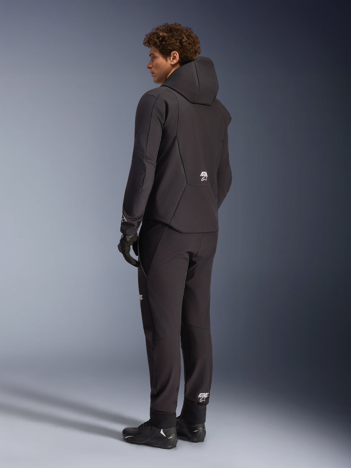 Alpinestars Aeroshell Waterproof Motorjas Zwart, schuin achteraanzicht
