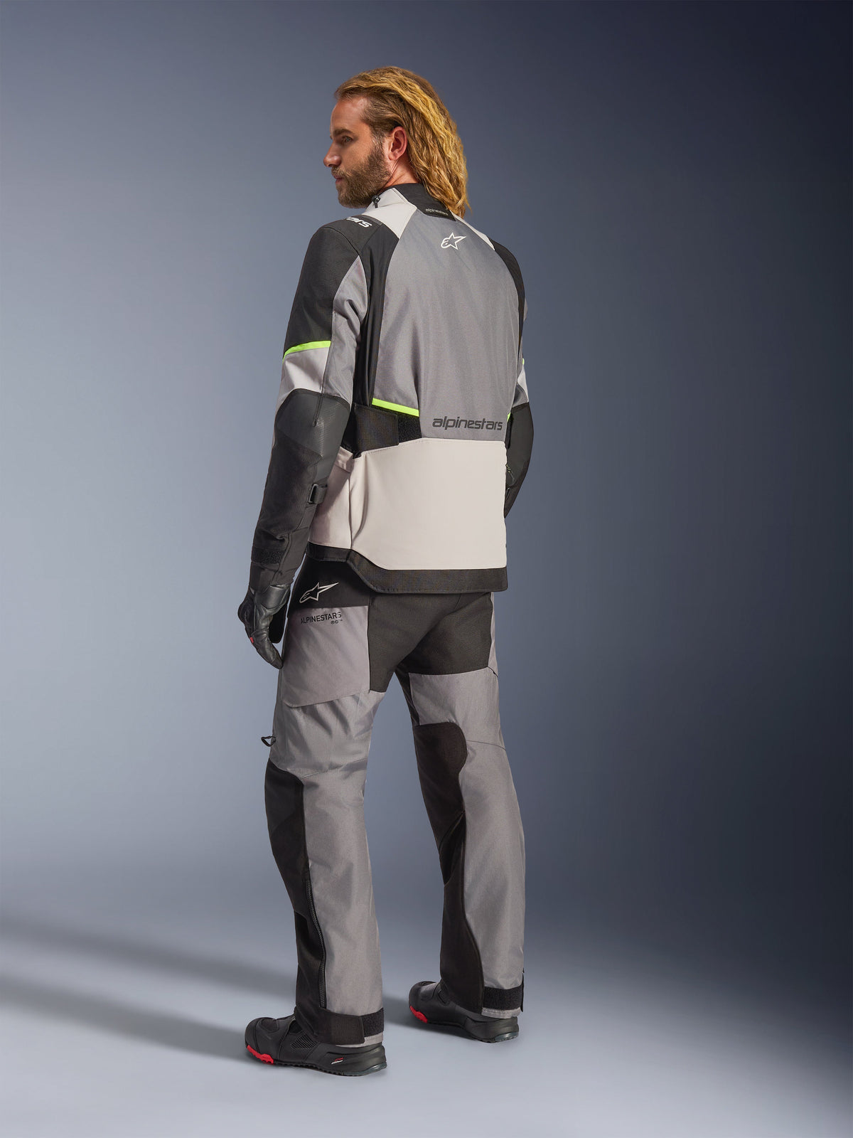 Alpinestars Andes v4 Drystar Motorjas Grijs en fluogeel, schuin achteraanzicht